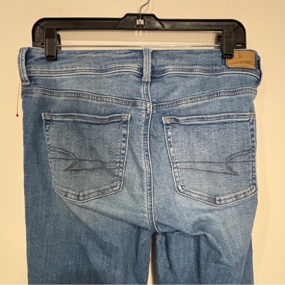 American Eagle Next Level Stretch High Rise Kick Boot Jeans in Light Wash Denim - Picture 4 of 12